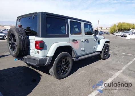 2023 Jeep Wrangler 4Xe Sahara 4X4 z USA, uszkodzony, nr VIN 1C4JJXP65PW683521